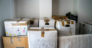 brown cardboard boxes on brown wooden table